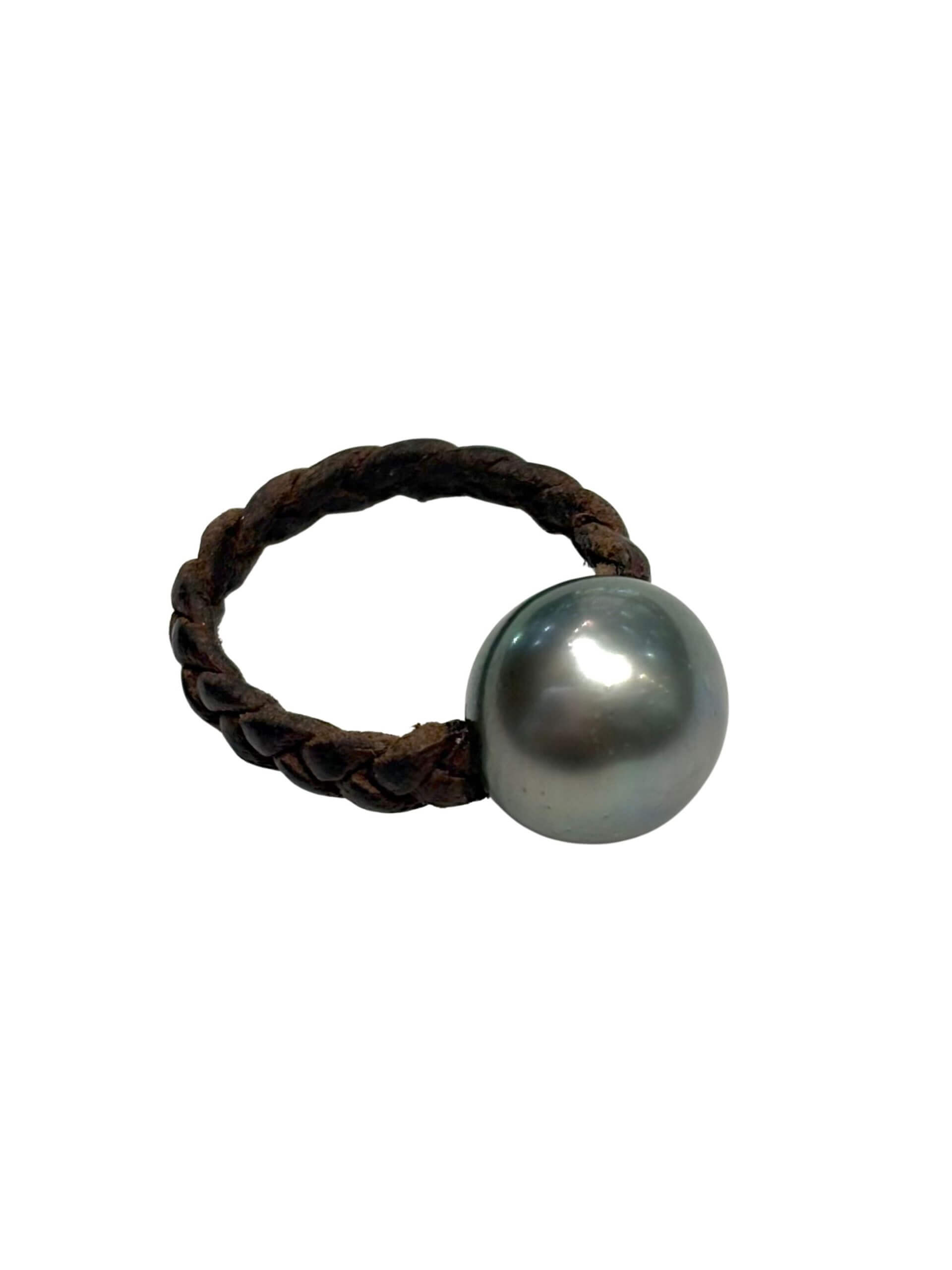 Braided leather ring with a single 12 mm Tahitian pearl centerpiece.