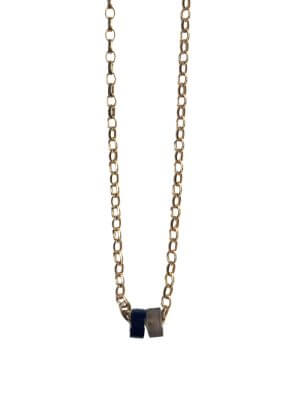 „Timeless 18K gold-plated sterling silver necklace, 48 cm length, adjustable to 46 cm and 44 cm, with two crystal donut pendants in onyx and smoky quartz; handcrafted from recycled materials, symbolizing grounding, clarity, and transformation.“