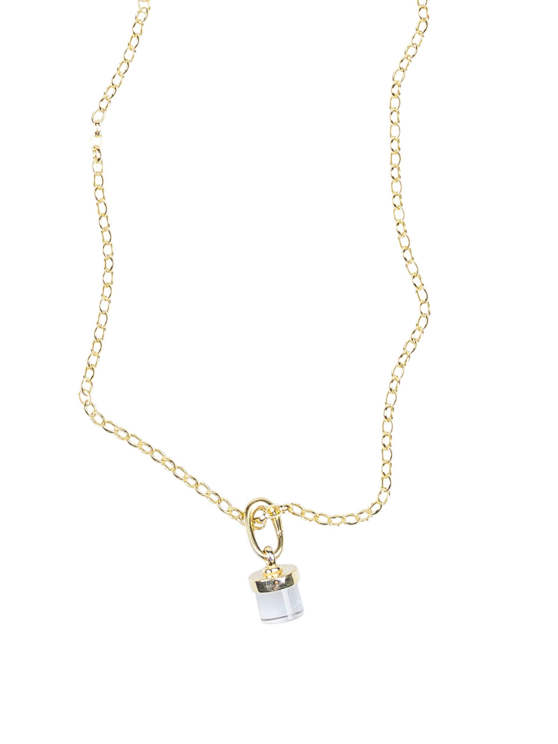 Close-up of a gold-plated sterling silver necklace with a single elegant chain, featuring a golden clear quartz charm and a refined clip for interchangeable crystal charms.