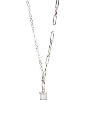 Close-up of a sterling silver necklace with a single chain, featuring a clear quartz charm and a sleek silver clip designed for interchangeable crystal charms.