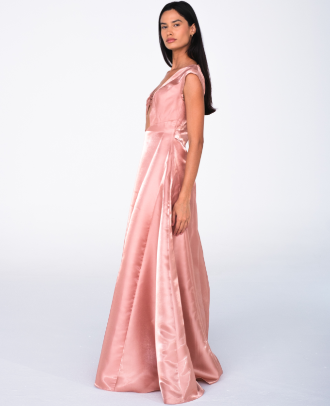 Side profile of Sara Pedram pink evening dress featuring a sculpted corset bodice, sweetheart neckline, and flowing floral satin skirt — couture gown for elegant formal occasions.